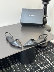 CHANEL 26S SLINGBACK FLATS IN BLACK LAMBSKIN