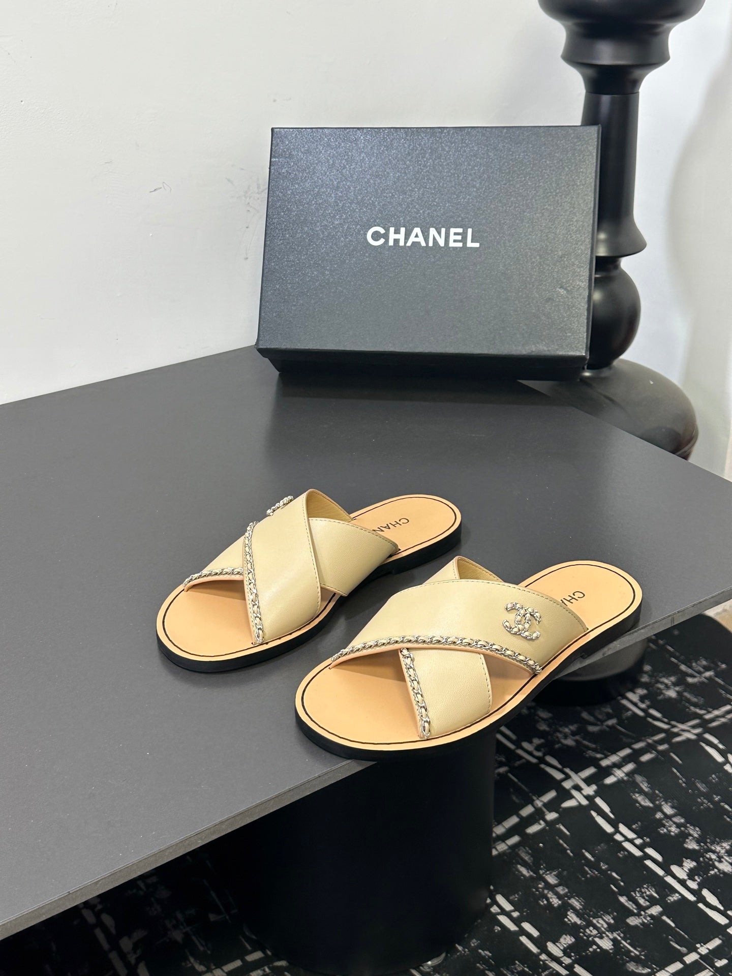 CHANEL 26S CROSS-STRAP SANDALS IN BEIGE LEATHER