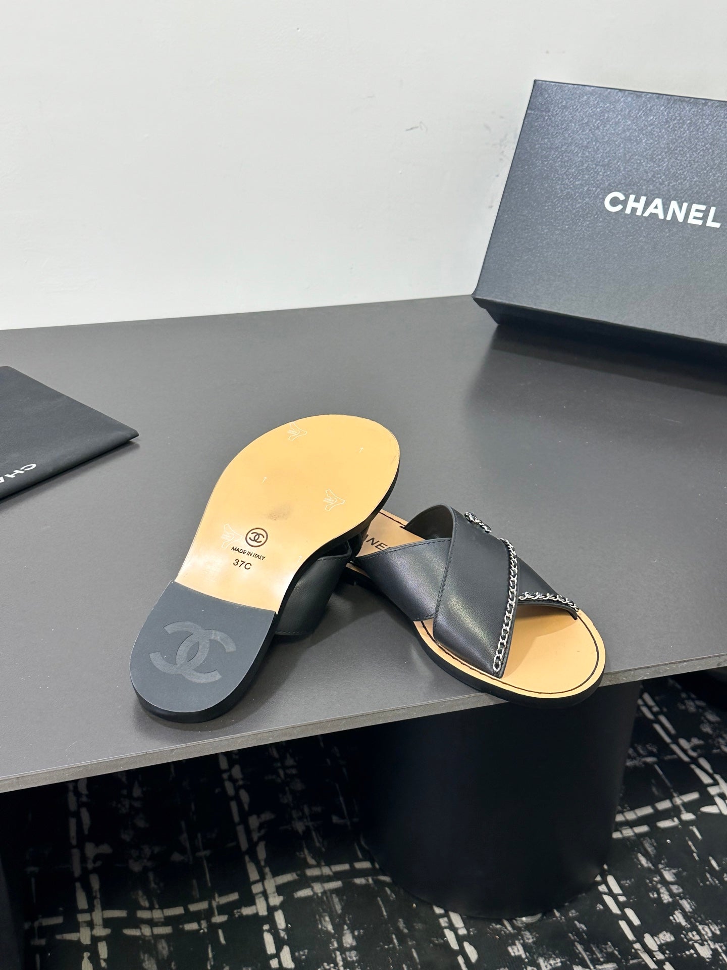CHANEL 26S CROSS-STRAP SANDALS IN BLACK LEATHER