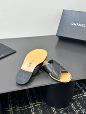 CHANEL 26S CROSS-STRAP SANDALS IN BLACK LEATHER