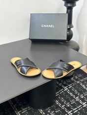 CHANEL 26S CROSS-STRAP SANDALS IN BLACK LEATHER
