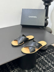 CHANEL 26S CROSS-STRAP SANDALS IN BLACK LEATHER