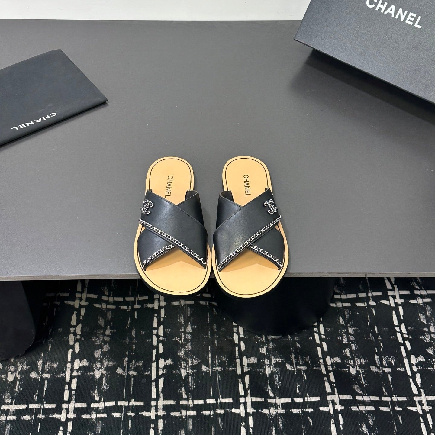 CHANEL 26S CROSS-STRAP SANDALS IN BLACK LEATHER