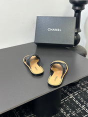 CHANEL 26S CROSS-STRAP SANDALS IN BLACK LEATHER