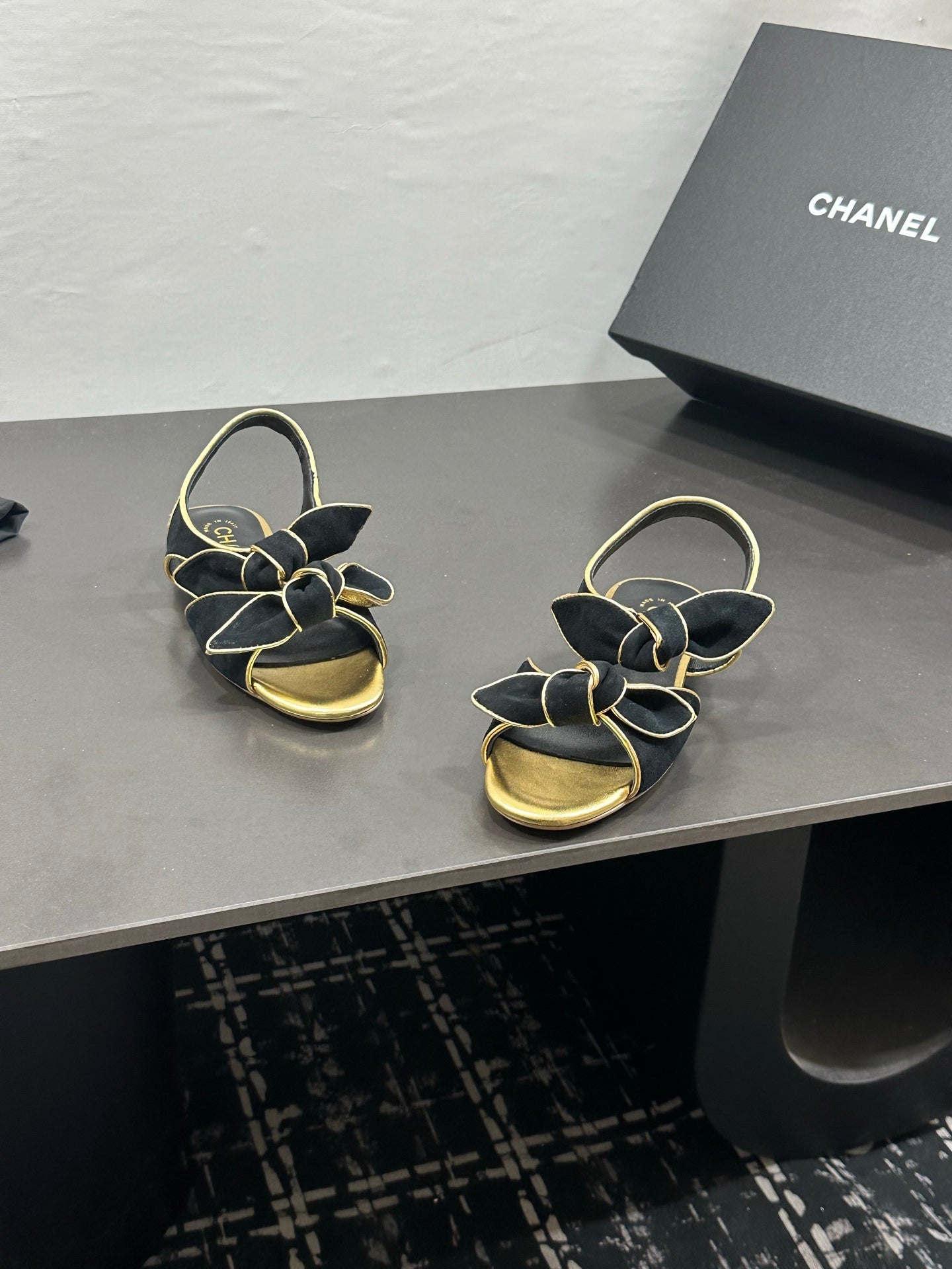 CHANEL 26S BOW SANDALS IN BLACK MIX GOLD SATIN