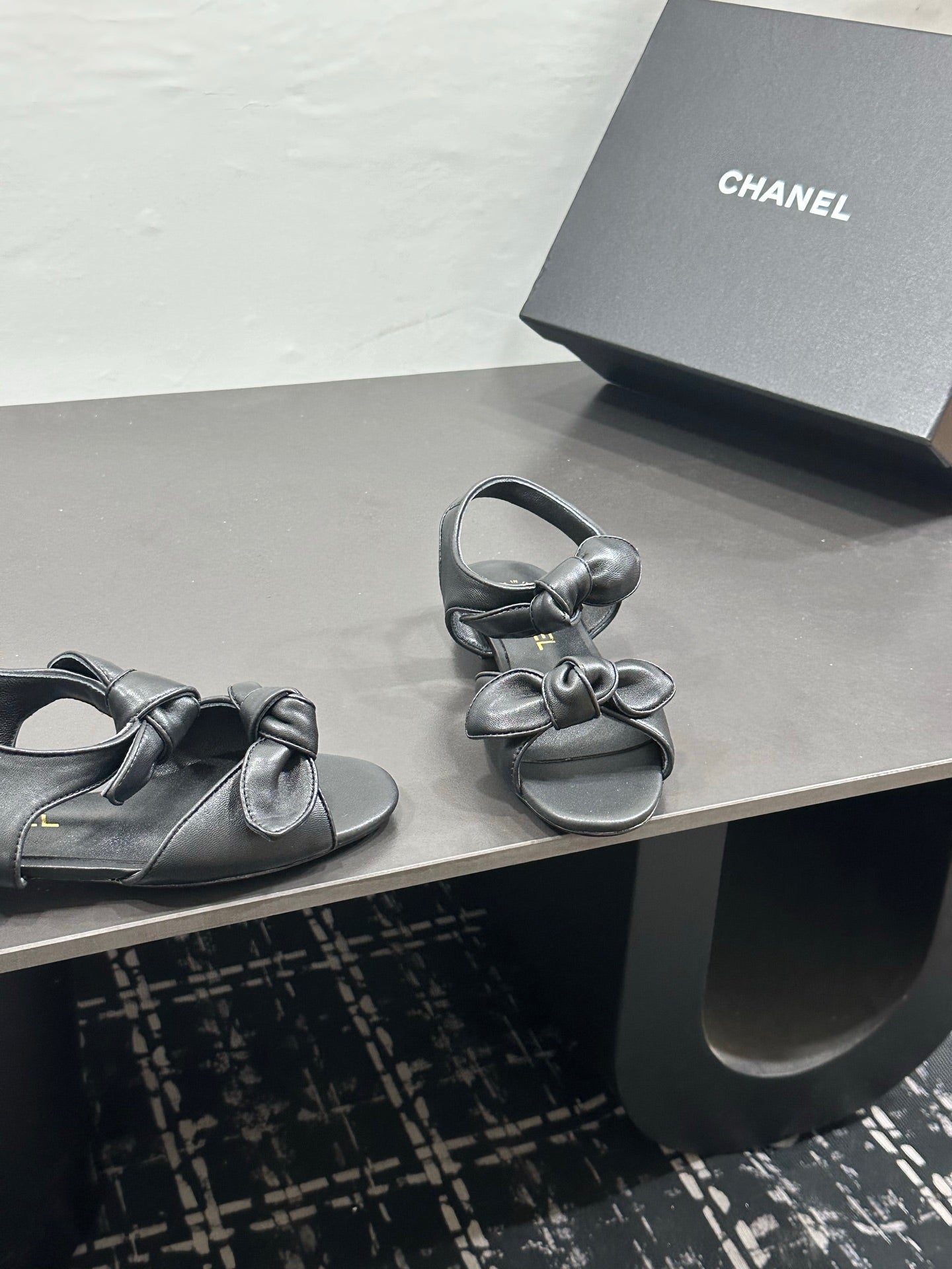 CHANEL 26S BOW SANDALS IN BLACK CALFSKIN