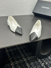 CHANEL 26S FLAT SHOES IN WHITE AND BLACK LAMBSKIN