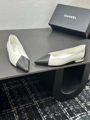 CHANEL 26S FLAT SHOES IN WHITE AND BLACK LAMBSKIN