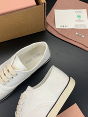 MIUMIU 26S LACE UP SNEAKERS IN WHITE CANVAS RUBBER SOLE