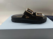 PRADA 26S STRAP SLIDES IN BLACK CROC EMBOSSED CALFSKIN GOLD HARDWARE