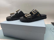 PRADA 26S STRAP SLIDES IN BLACK CROC EMBOSSED CALFSKIN GOLD HARDWARE