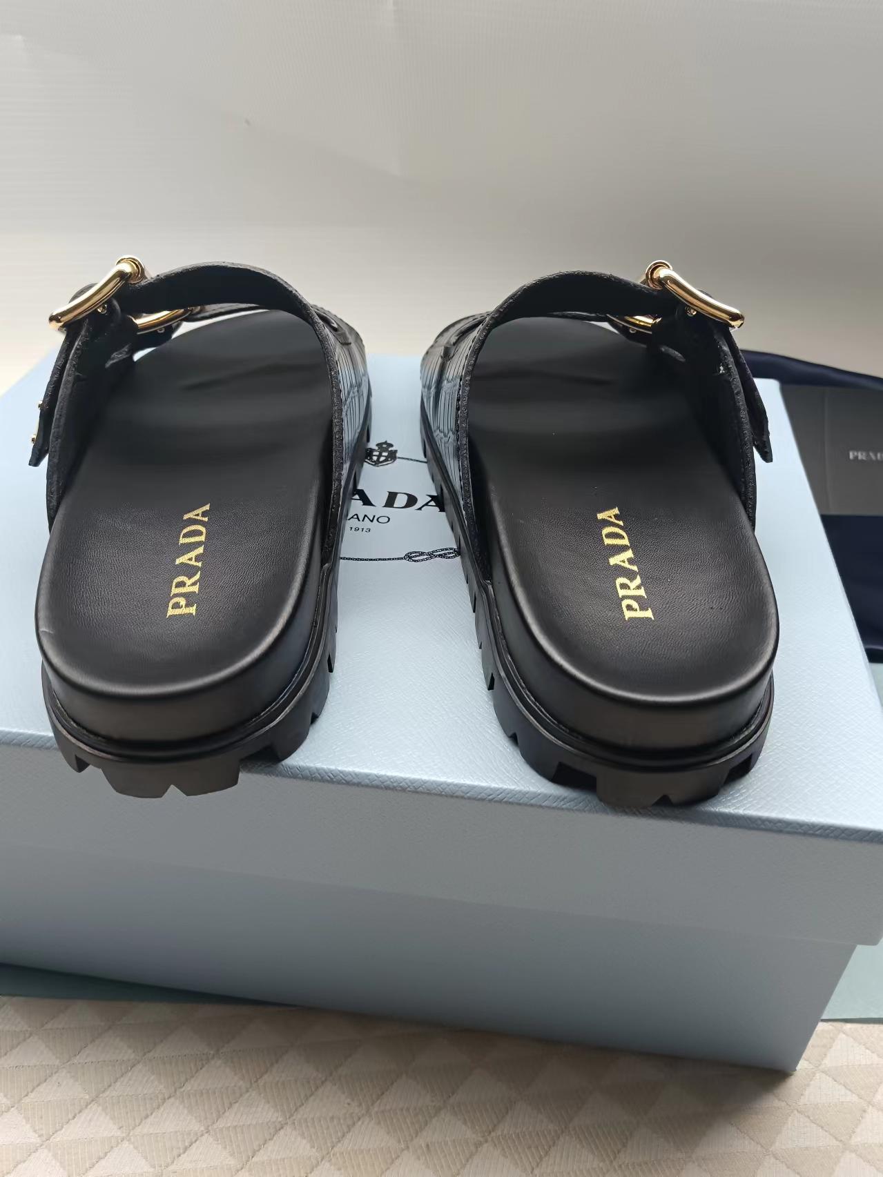 PRADA 26S STRAP SLIDES IN BLACK CROC EMBOSSED CALFSKIN GOLD HARDWARE
