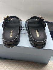 PRADA 26S STRAP SLIDES IN BLACK CROC EMBOSSED CALFSKIN GOLD HARDWARE