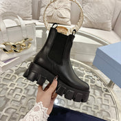PRADA 26S MONOLITH CHELSEA BOOTS IN BLACK SHINY CALFSKIN AND FABRIC