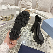 PRADA 26S MONOLITH CHELSEA BOOTS IN BLACK SHINY CALFSKIN AND FABRIC