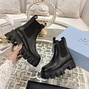 PRADA 26S MONOLITH CHELSEA BOOTS IN BLACK SHINY CALFSKIN AND FABRIC
