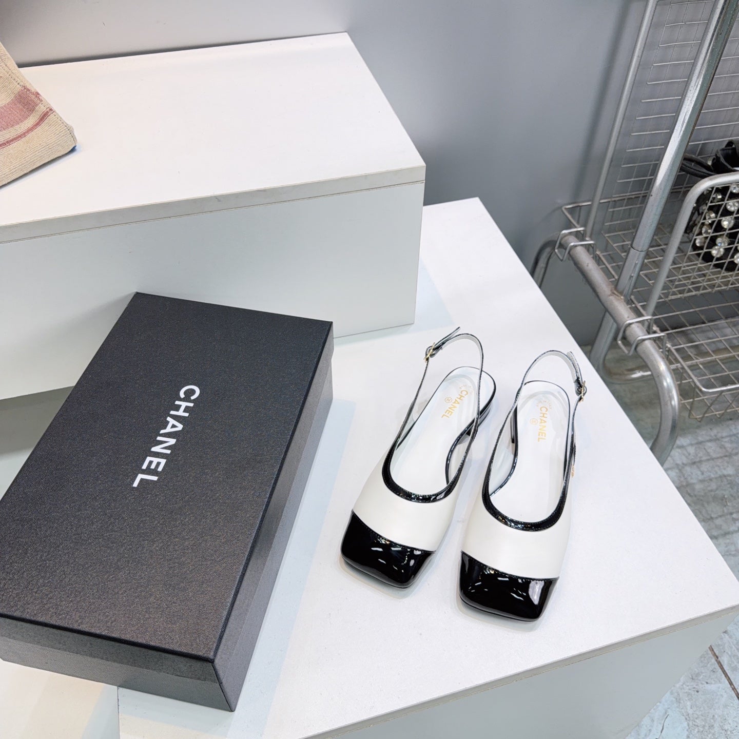 CHANEL 26S SLINGBACK PUMPS IN BLACK AND WHITE PATENT LAMBSKIN