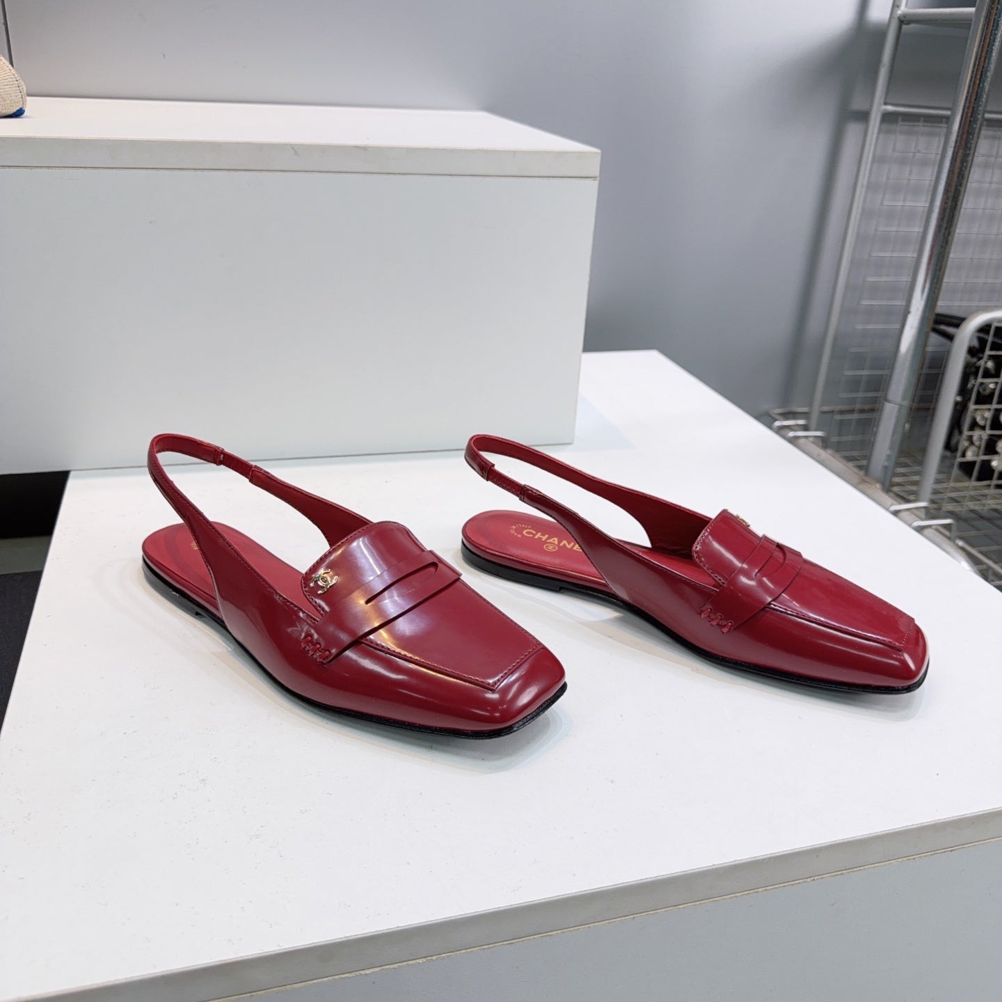 CHANEL 26S SLINGBACK FLATS IN BURGUNDY PATENT LAMBSKIN