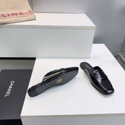 CHANEL 26S LOAFER MULES IN BLACK PATENT LAMBSKIN
