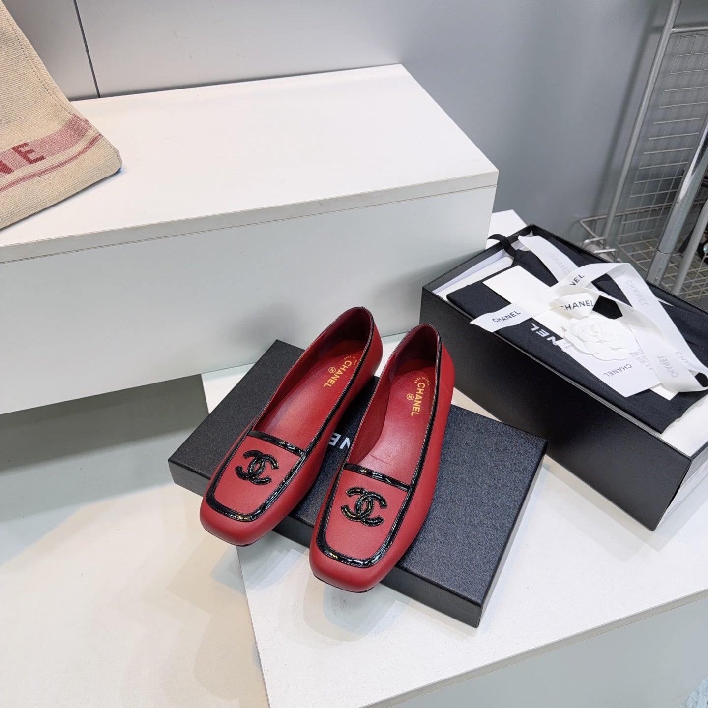 CHANEL 26S SQUARE TOE FLATS IN RED CALFSKIN WITH BLACK PATENT