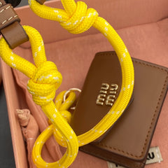 MICRO BAG 7 IN TAWNY BROWN SMOOTH LAMBSKIN YELLOW STRAP