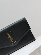 UPTOWN WALLET 21 IN BLACK CALFSKIN GOLD LOGO