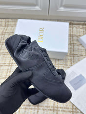 DIOR 26S LOW TOP SNEAKERS IN BLACK SATIN DIOR LOGO