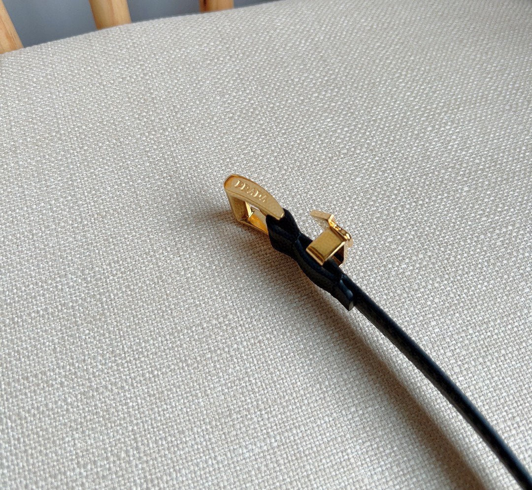 PRADA 25S BELT 15 MM IN BLACK CALFSKIN 571356