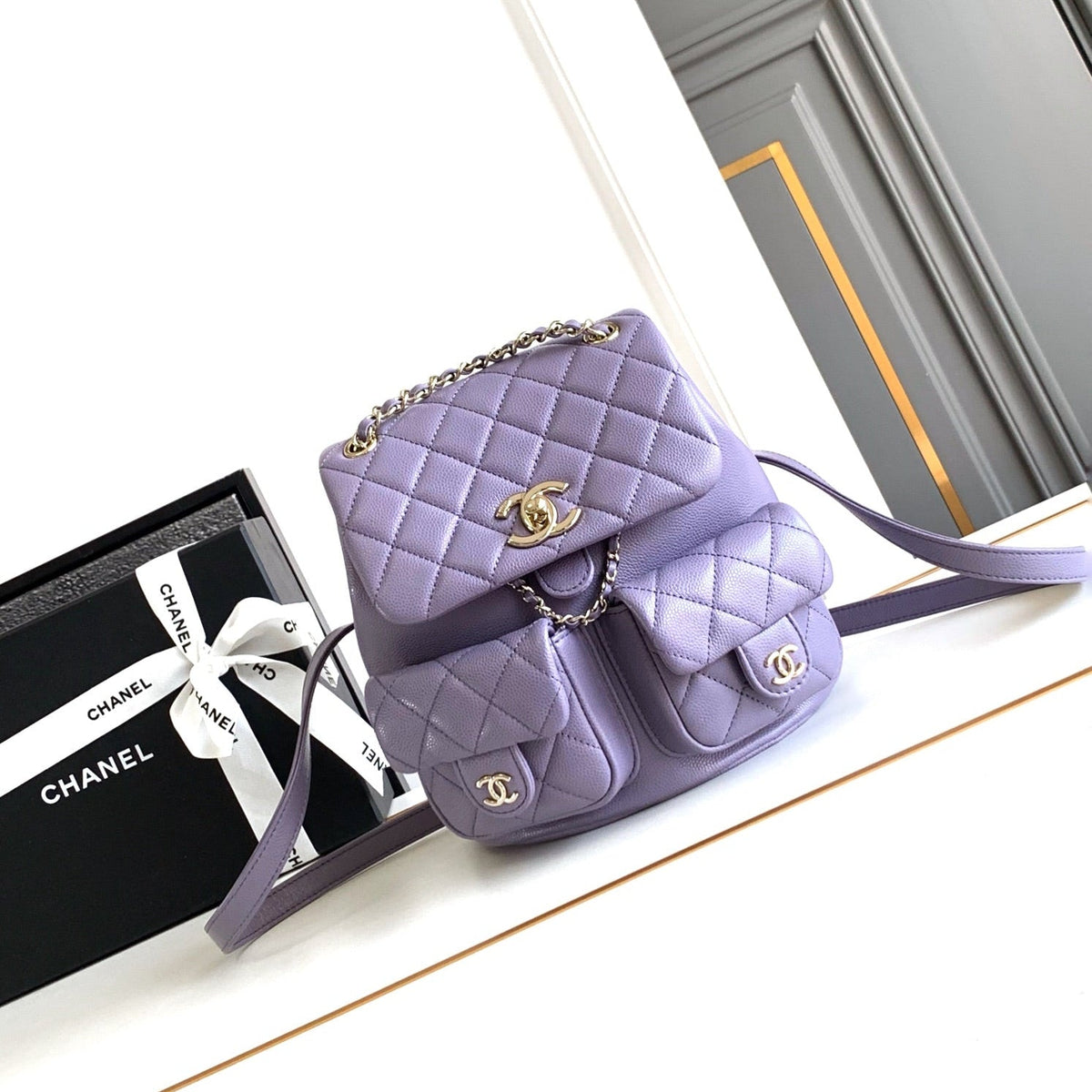 CHANEL 25S BACKPACK 21 CM IN PURPLE LAMBSKIN