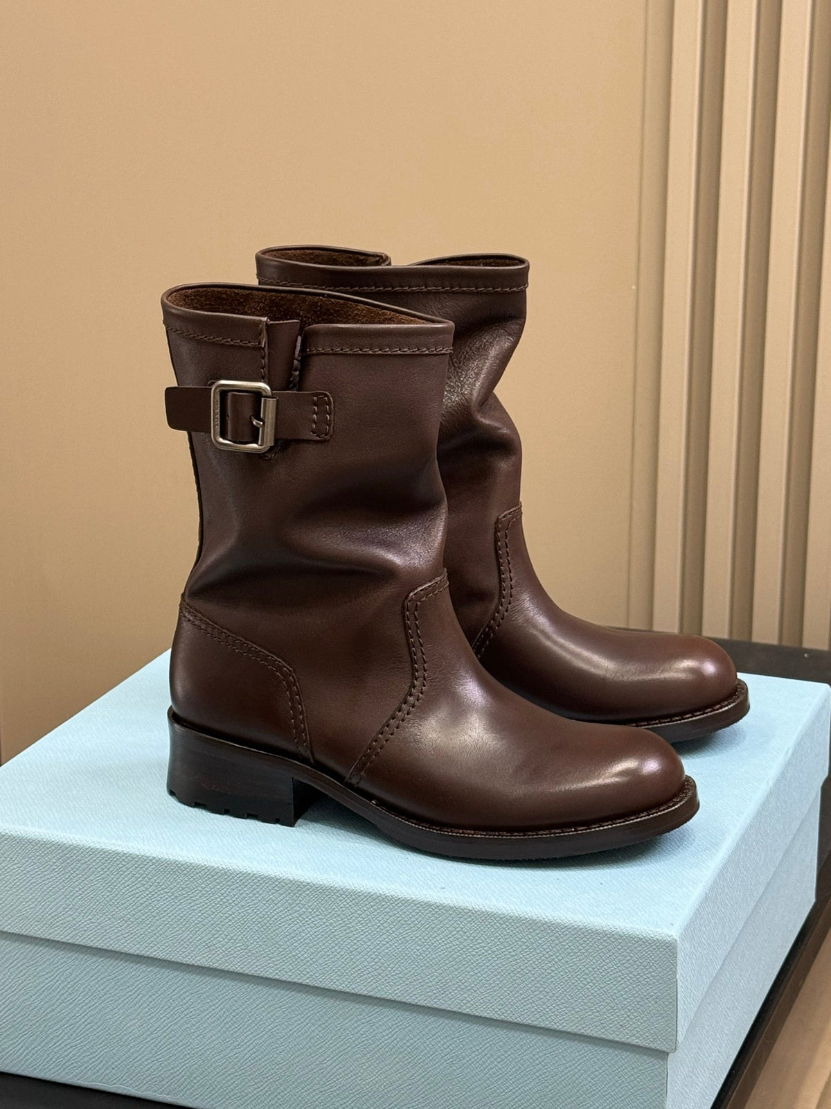 PRADA 25S ANKLE BOOTS IN BROWN CALFSKIN