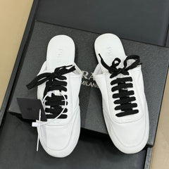 PRADA 25S COLLAPSE MULES IN WHITE CALFSKIN