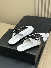 PRADA 25S COLLAPSE MULES IN WHITE CALFSKIN