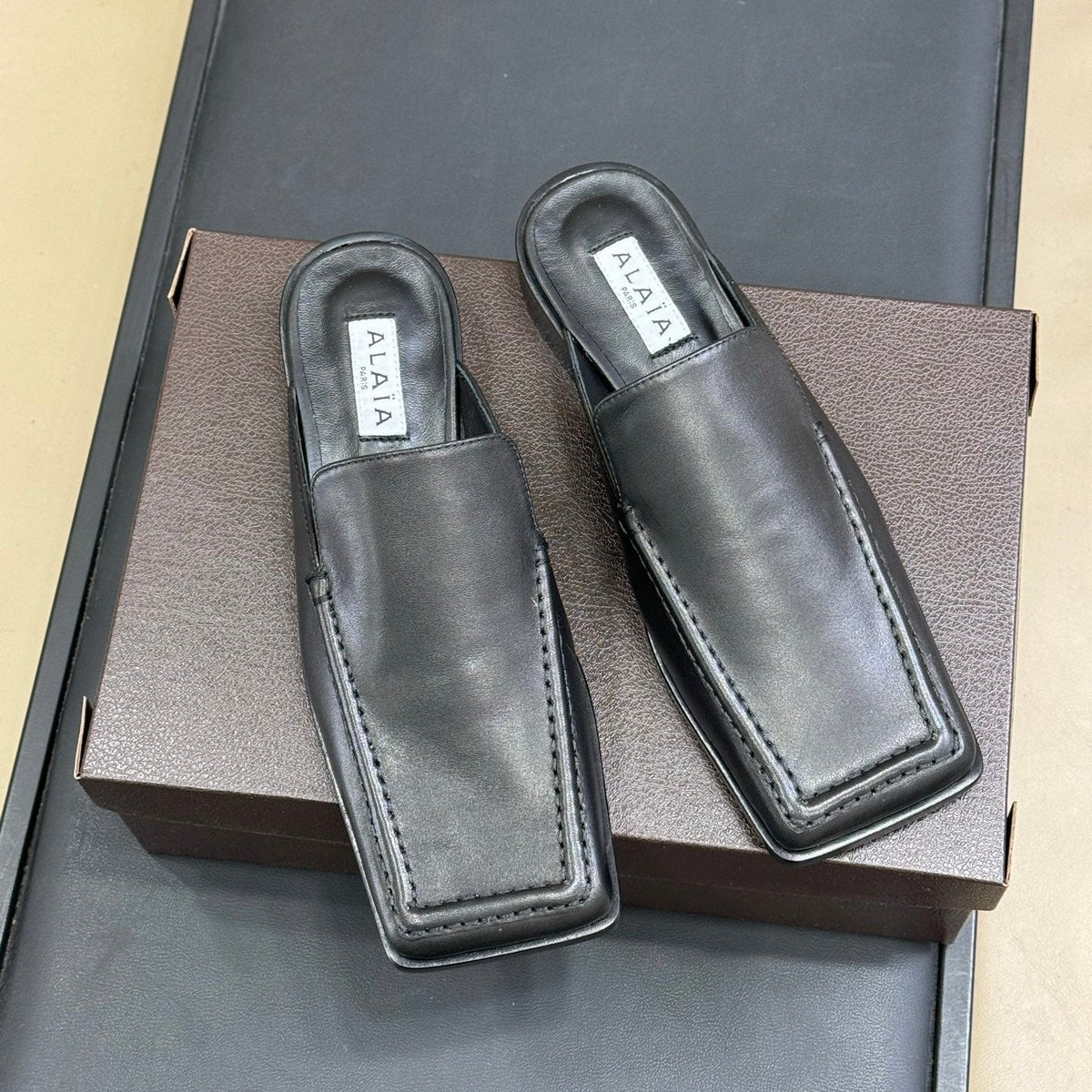 ALAIA 25S SQUARE LOAFER MULES IN BLACK CALFSKIN