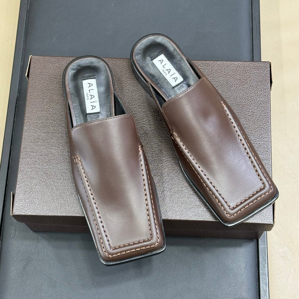 ALAIA 25S SQUARE LOAFER MULES IN BROWN CALFSKIN