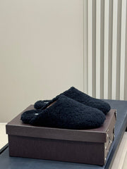 ALAIA 25S SHEARLING COZY SLIPPERS IN BLACK