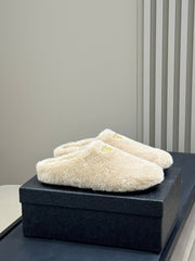 PRADA 25S CLOGS IN BEIGE SHEARLING