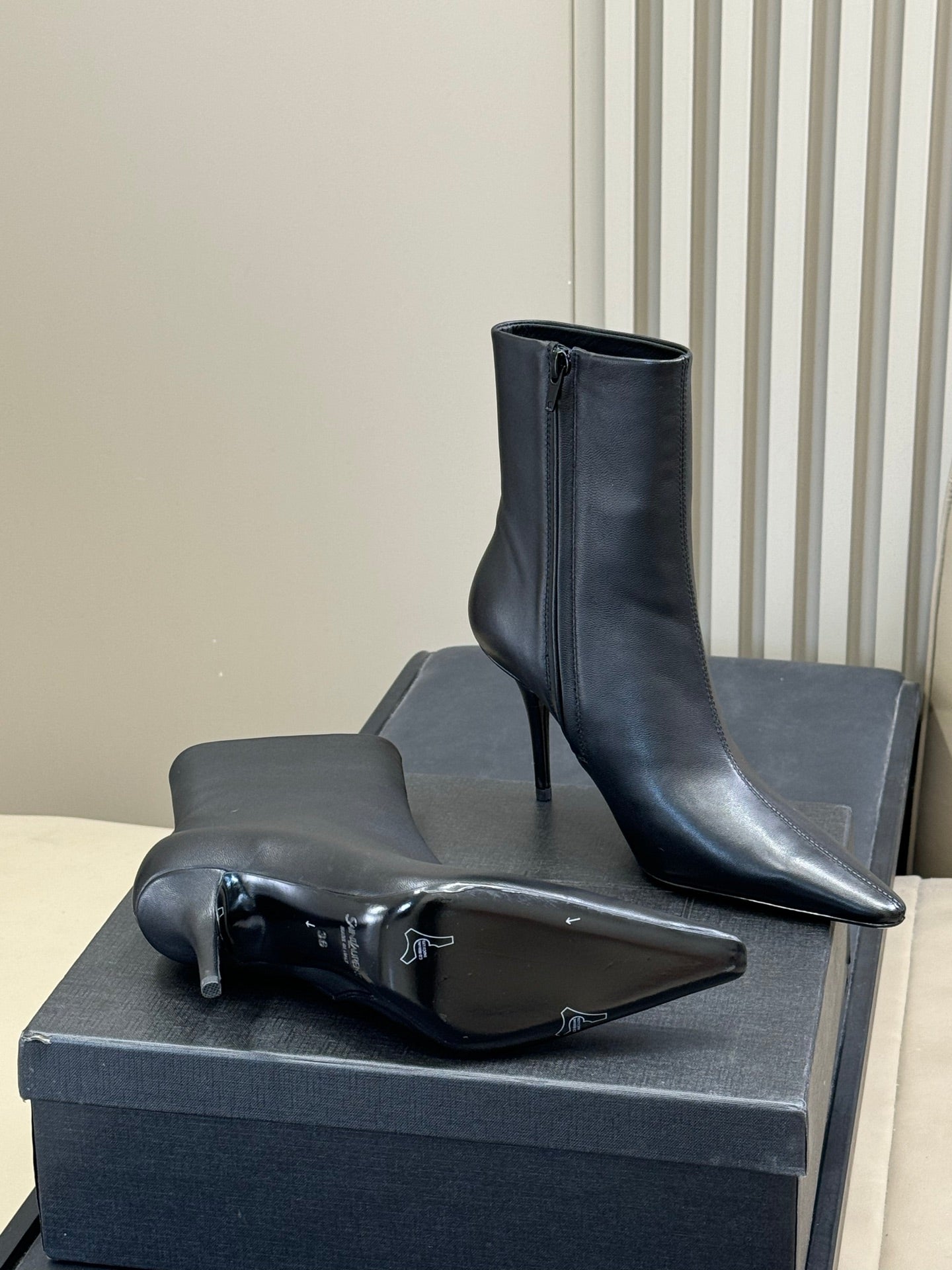YSL 26S ZIPPERED HEELED BOOTS IN BLACK CALFSKIN