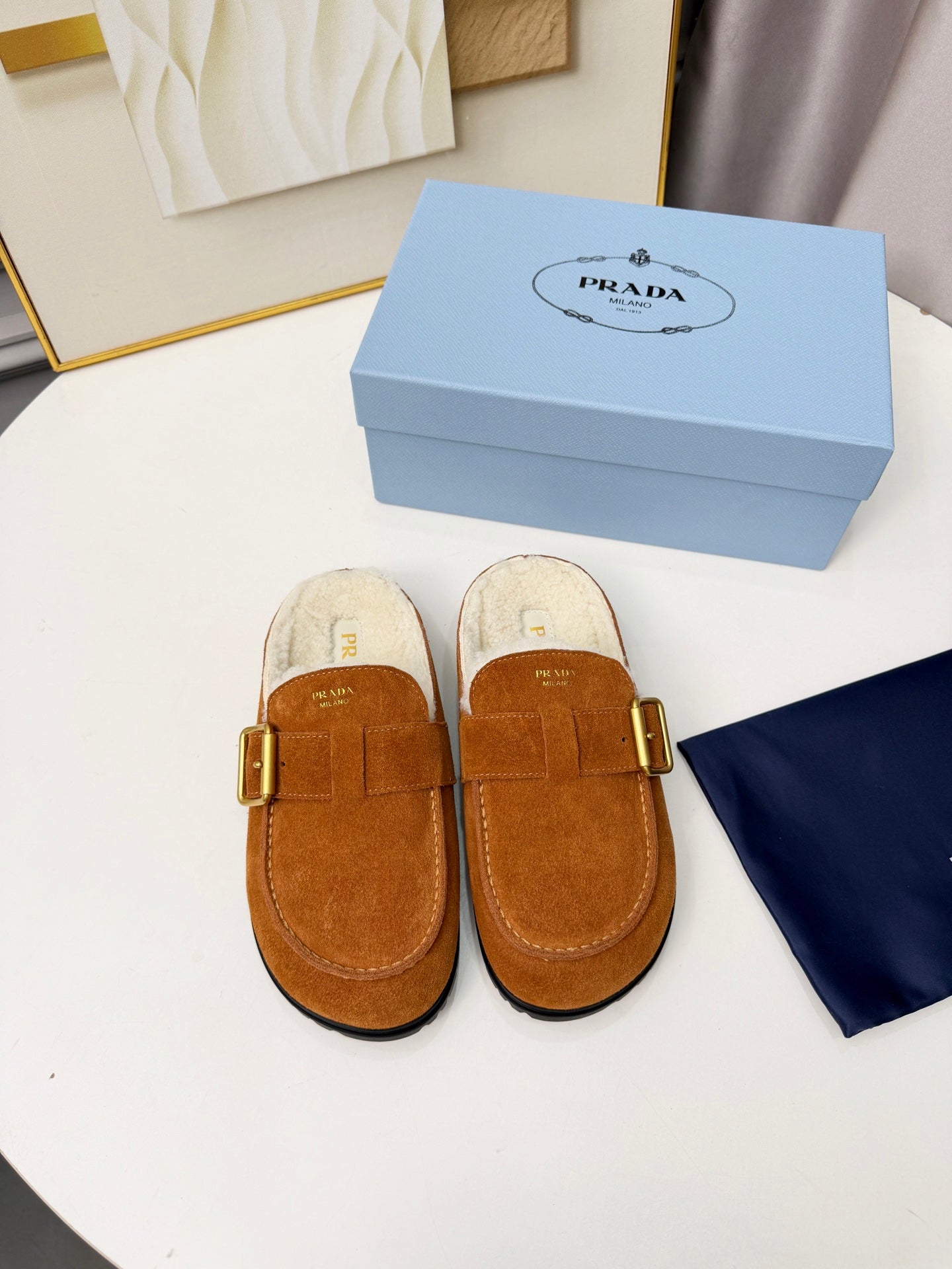 PRADA 26S SHEARLING-LINED MULES IN COGNAC BROWN SUEDE
