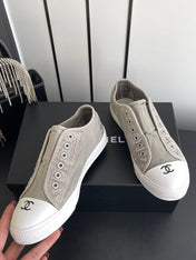 CHANEL 26S LOW TOP SNEAKERS IN GREY CANVAS