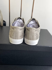 CHANEL 26S LOW TOP SNEAKERS IN GREY CANVAS