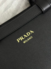 PRADA 25S BUCKLE MEDIUM HANDBAG 28 IN BLACK CALFSKIN GOLD HARDWARE