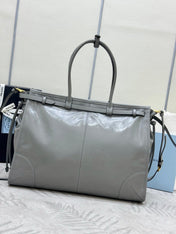 PRADA 25S LUX SOFT BAG 42 IN GRAY GLOSSY CALFSKIN GOLD HARDWARE