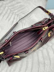 PRADA 25S BONNIE SMALL SHOULDER BAG 26 IN BURGUNDY GLOSSY CALFSKIN GOLD HARDWARE