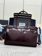 PRADA 25S BONNIE LARGE HANDBAG 38 IN BURGUNDY GLOSSY CALFSKIN GOLD HARDWRE