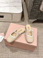 FLAT MULE IN BISQUE BEIGE PATENT CALFSKIN