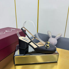 GG HIGH SLINGBACK 65 IN BLACK LAMBSKIN WITH GOLD HARDWARE