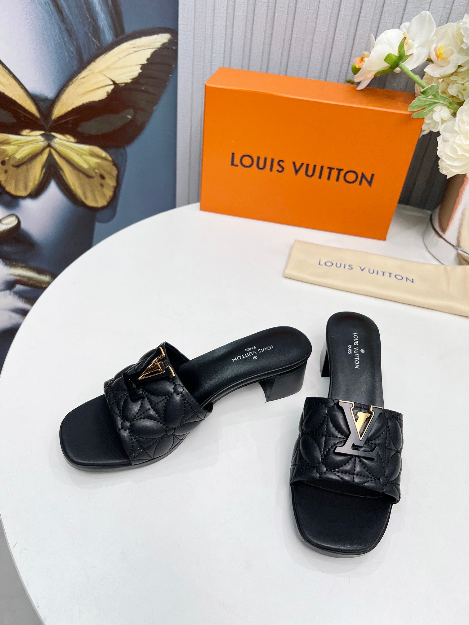 LV 26S MARE HIGH-HEELED MULE SANDALS IN BLACK CALFSKIN