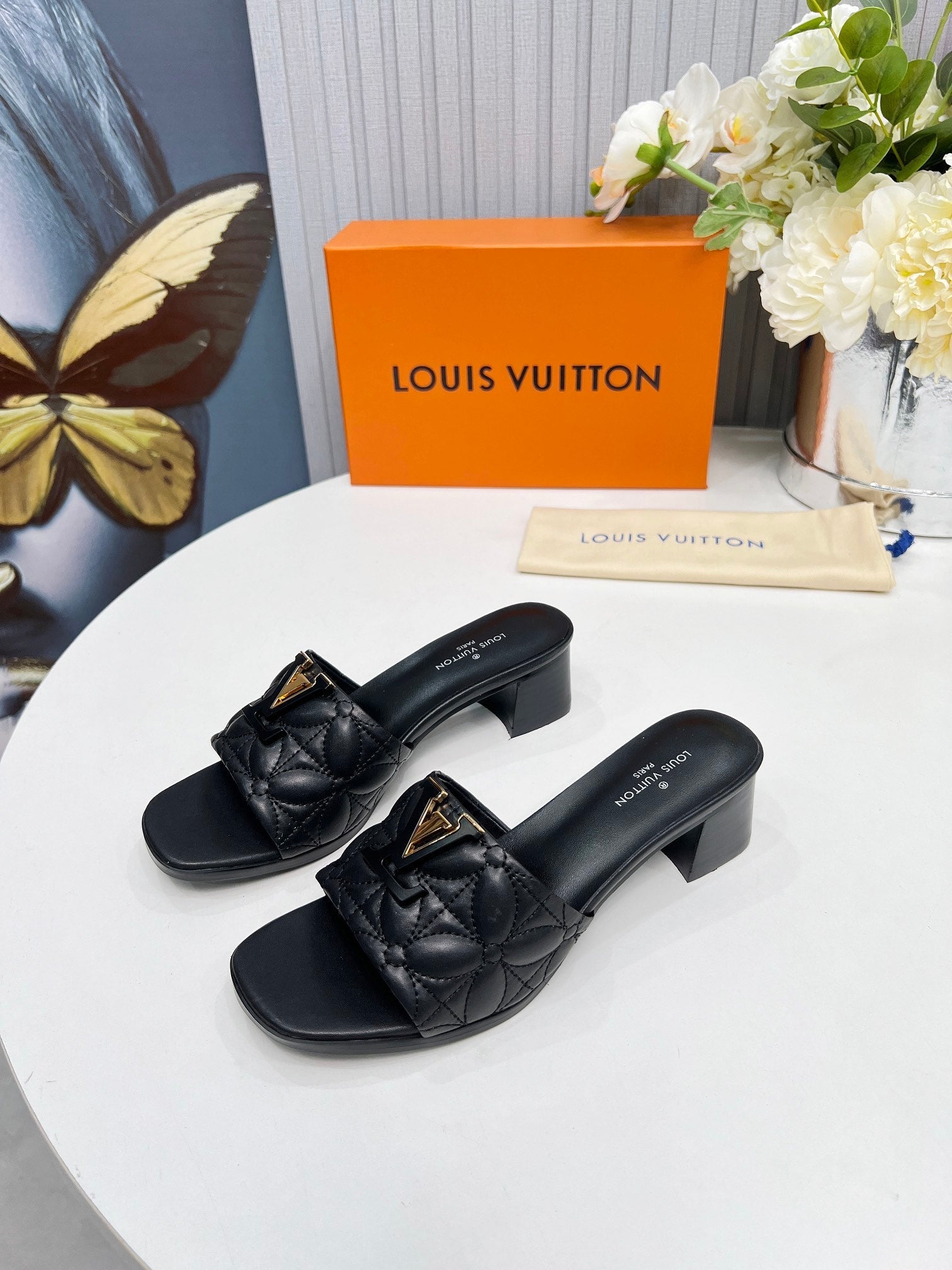 LV 26S MARE HIGH-HEELED MULE SANDALS IN BLACK CALFSKIN