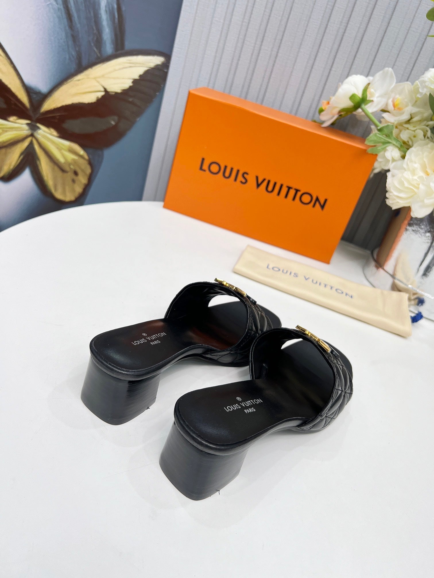 LV 26S MARE HIGH-HEELED MULE SANDALS IN BLACK CALFSKIN