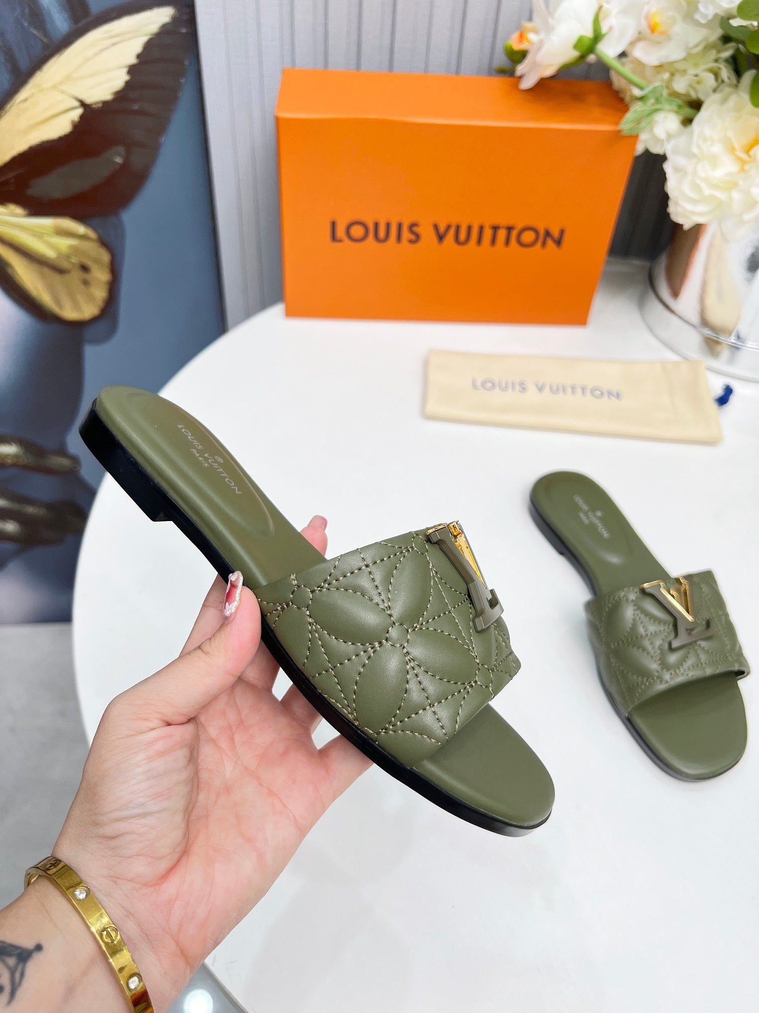 LV 26S MARE FLAT MULES IN MOSS GREEN CALFSKIN
